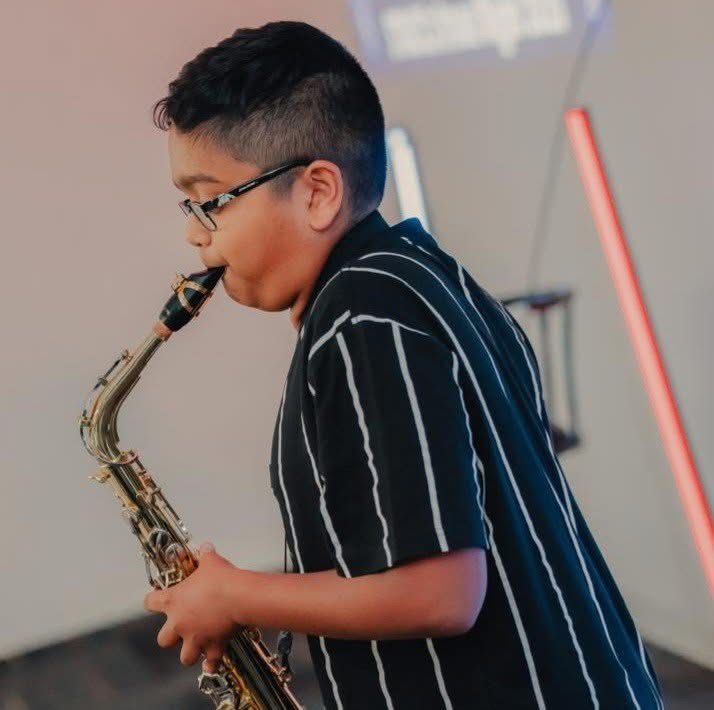 Ashane performing on stage